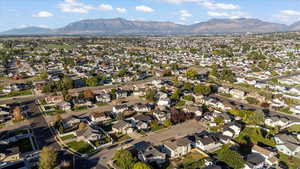 View of property location with a mountainous background and nearby suburban area