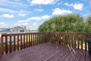 Wooden deck featuring a residential view