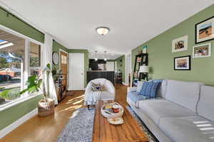 Living area with hardwood / wood-style flooring