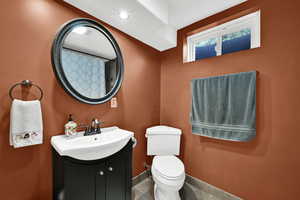 Full bathroom with vanity, tile patterned floors, and a shower with curtain