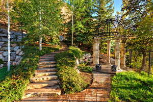 View of yard featuring stairway