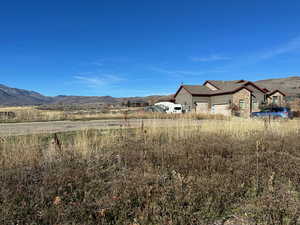 View of yard with a mountain view