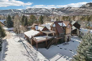 Snowy aerial view with a mountain view