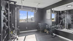 Workout room with rubber floors and baseboards