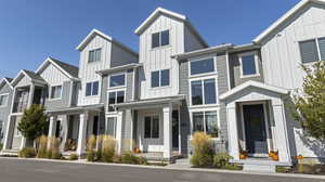 Modern farmhouse with board and batten siding and a residential view