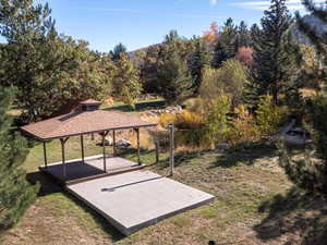 Gazebo next to pond.