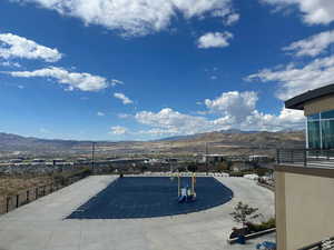 View of pool featuring a patio area and a mountain view