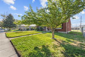View of front facade featuring brick siding
