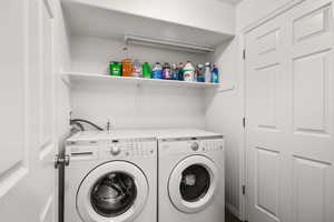 Laundry area featuring separate washer and dryer