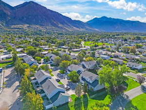 Aerial view of residential area featuring mountains