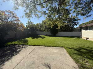 View of fenced backyard