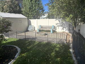 View of fenced backyard