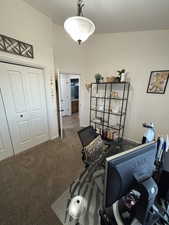 Playroom featuring carpet floors and an office area