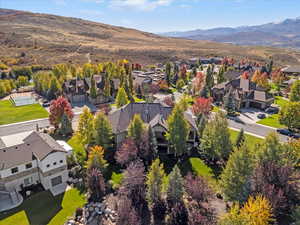 Aerial view of residential area with a mountainous background