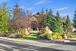 View of property hidden behind natural elements