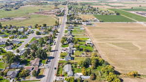 Aerial view of property's location with rural landscape and large plots for crops