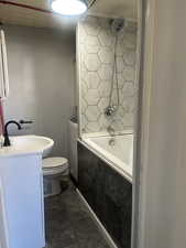 Bathroom with vanity and shower / bath combo