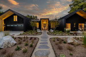 View of front of house with concrete driveway
