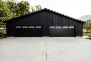 Detached garage featuring a mountain view