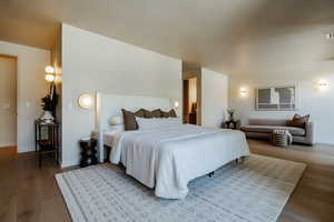 Bedroom with wood finished floors