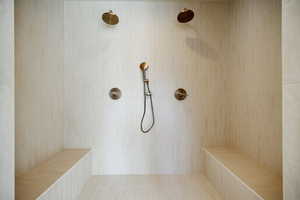 Bathroom featuring a tile shower