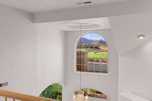 Detailed view of a mountain backdrop and a chandelier