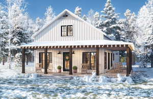 View of front of home featuring board and batten siding and covered porch