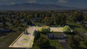 Aerial view of property's location with mountains