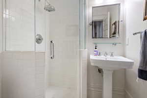 Bathroom featuring a stall shower