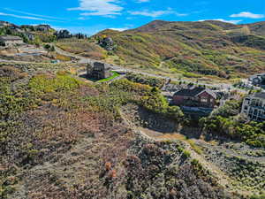 View of mountain background featuring nearby suburban area