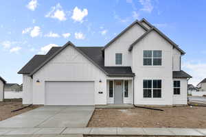 Modern inspired farmhouse featuring roof with shingles, board and batten siding, concrete driveway, an attached garage, and a porch