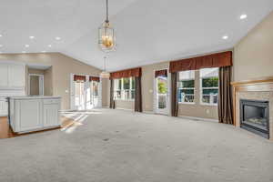 Entrance to the back covered patio and deck through the semi-formal dining area.