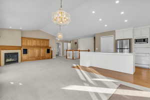 Bright kitchen with island seating and open sightlines to the great room.