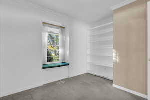 Private Den with shelving.