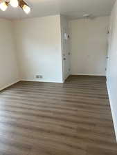 Unfurnished room featuring wood finished floors