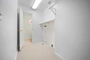 Laundry room featuring electric dryer hookup and gas dryer hookup