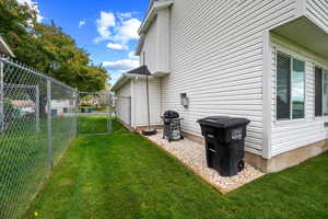 View of yard featuring a gate