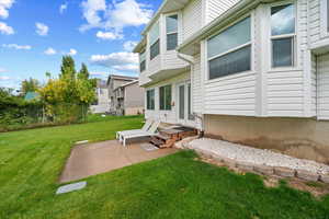 Rear view of house with a patio
