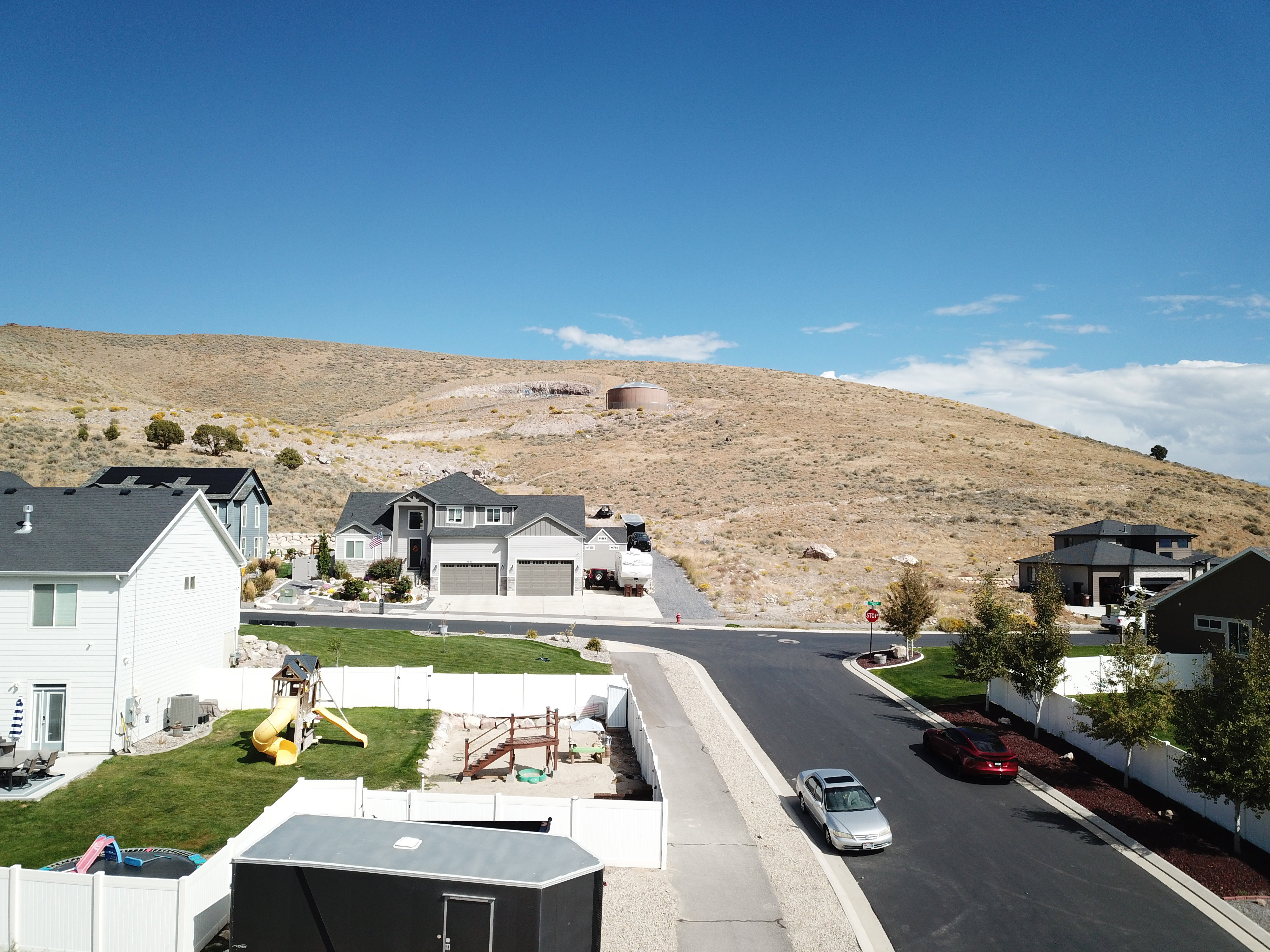 View of mountain background featuring nearby suburban area