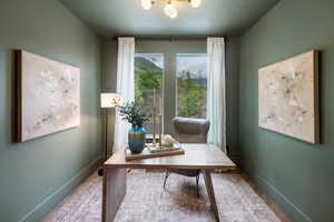 Office featuring a textured ceiling and wood finished floors