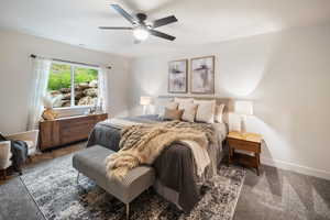 Bedroom with carpet flooring and ceiling fan