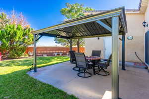 View of patio featuring a gazebo