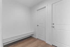 Mudroom with light wood-type flooring