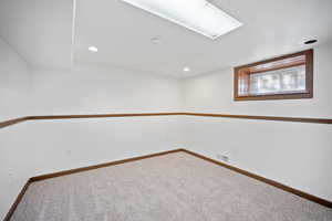 Spare room with carpet and recessed lighting