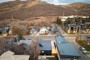 Aerial view of residential area with a mountain backdrop
