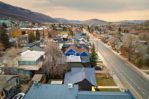 Aerial view at dusk of a residential view and a mountain view