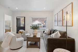 Living area featuring recessed lighting and wood finished floors