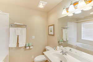 Bathroom featuring toilet and vanity