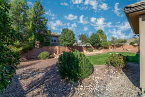 View of fenced backyard