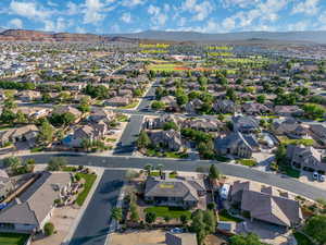 View of property location with nearby suburban area
